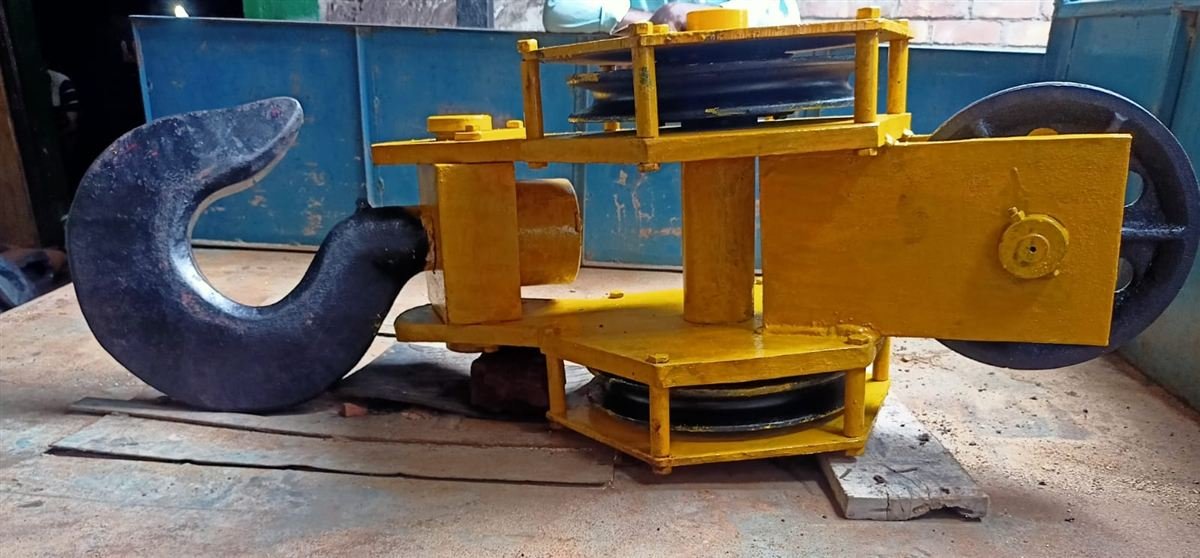 Yellow multi-sheave hook block assembly with large black hook
